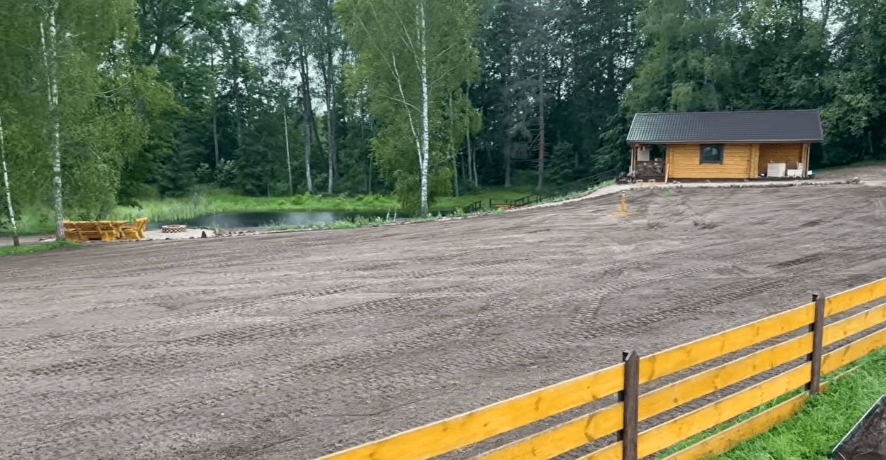 After: Cleared and smoothed soil graded land ready for seeding